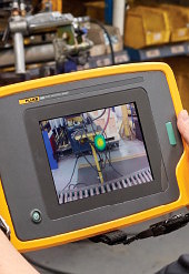 Close up application photo of leak detection in a facility with acoustic imaging 